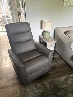 Hercules Swivel Glider Recliner Adjustable Headrest | Living Spaces