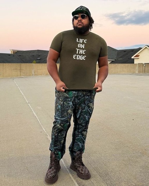 ASOS DESIGN lace up worker boots in brown monogram with chunky sole