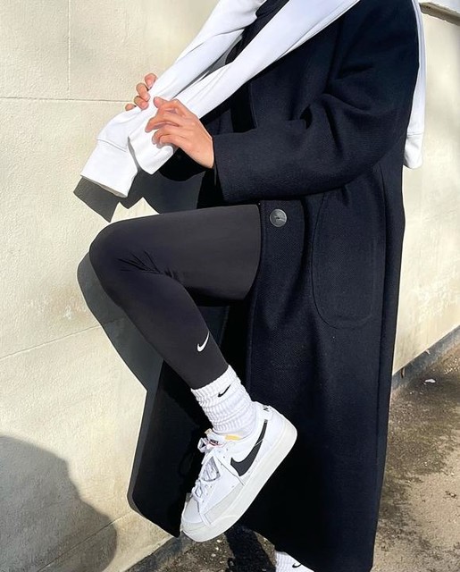 nike blazer low platform trainers in white and black
