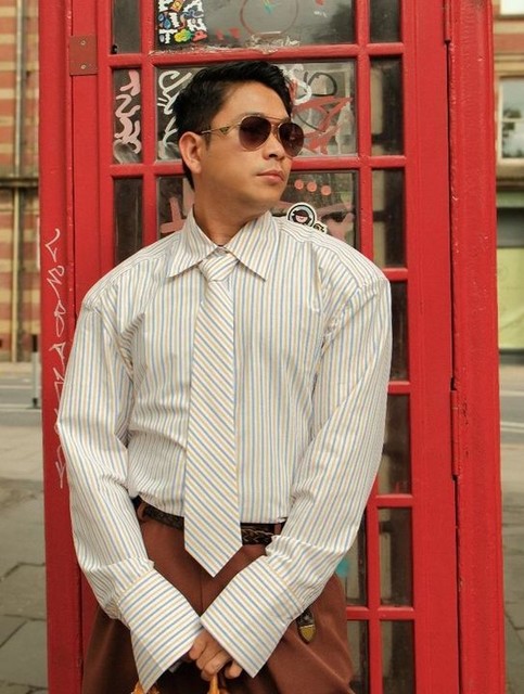 ASOS DESIGN cinch waist shirt with shoulder pads and tie in yellow stripe